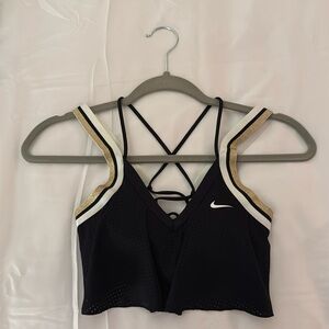 Nike sports bra, black, white, and gold